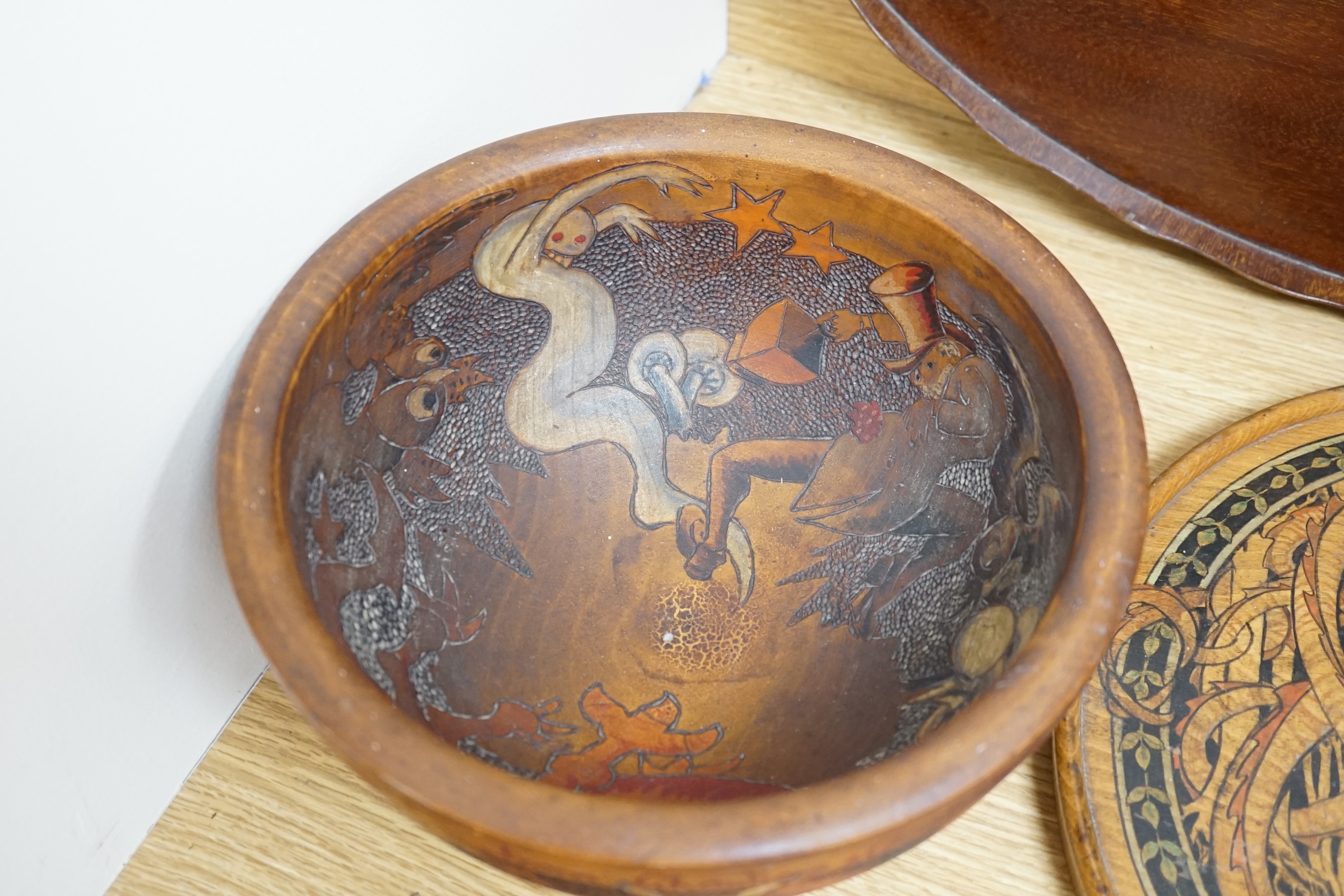 A group of wood items to include two cribbage boards, a mahogany solitaire board with marbles, a truncheon and an inlaid oval tray. etc., largest 60cm wide. Condition - varies, poor to fair